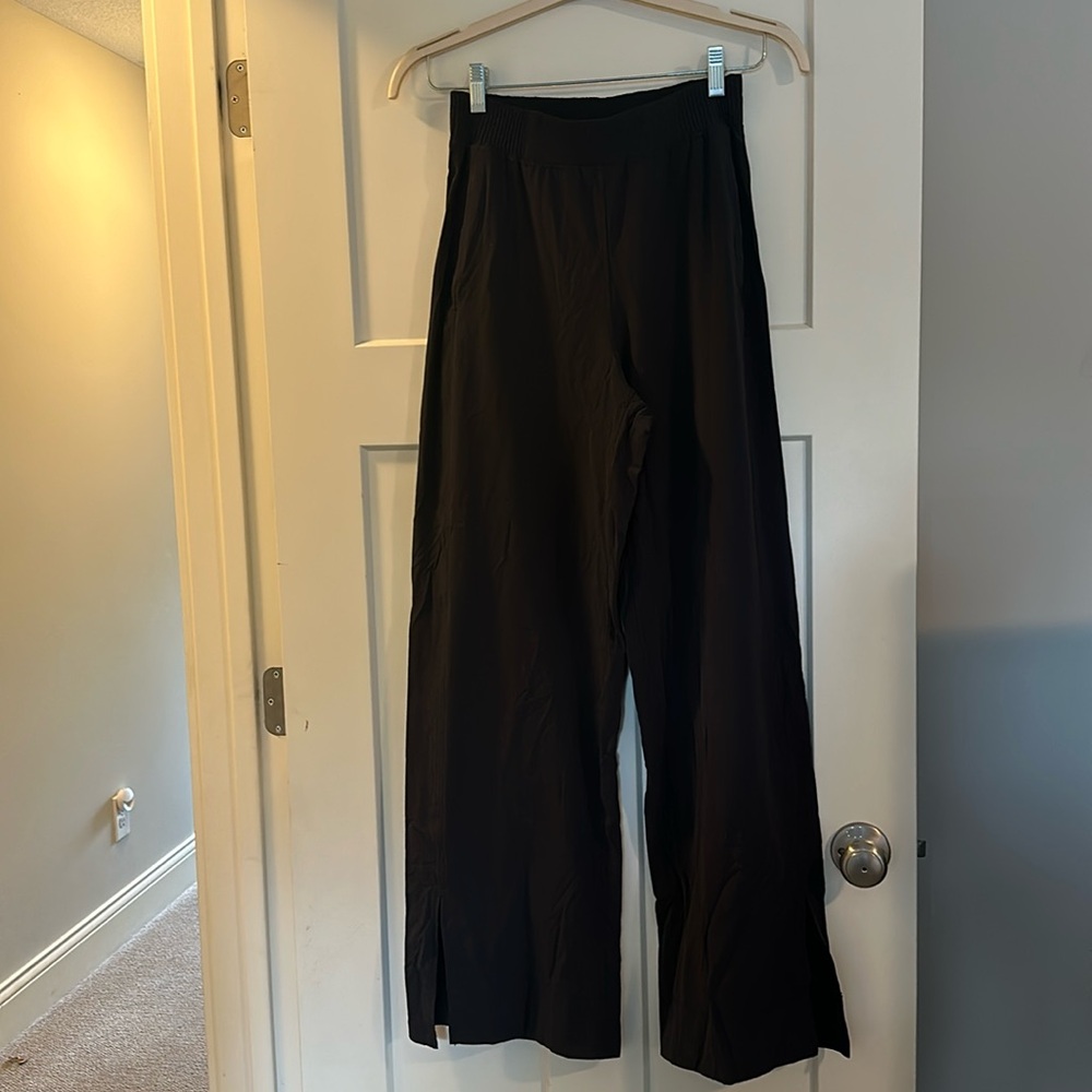 lululemon pull on wind pants with wide leg / slit bottoms